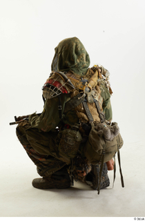 Photos John Hopkins Army Postapocalyptic Suit Poses kneeling whole body…